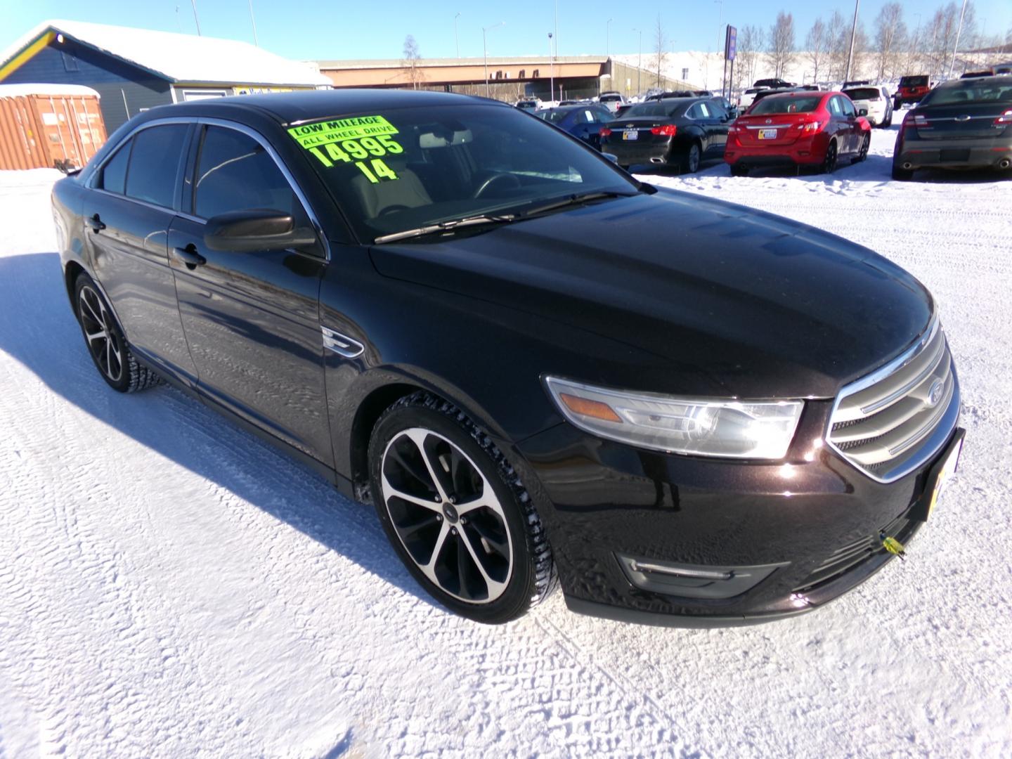 2014 Brown Ford Taurus SEL (1FAHP2H85EG) with an 3.5L V6 DOHC 24V engine, 6-Speed Automatic transmission, located at 2630 Philips Field Rd., Fairbanks, AK, 99709, (907) 458-0593, 64.848068, -147.780609 - Photo#0